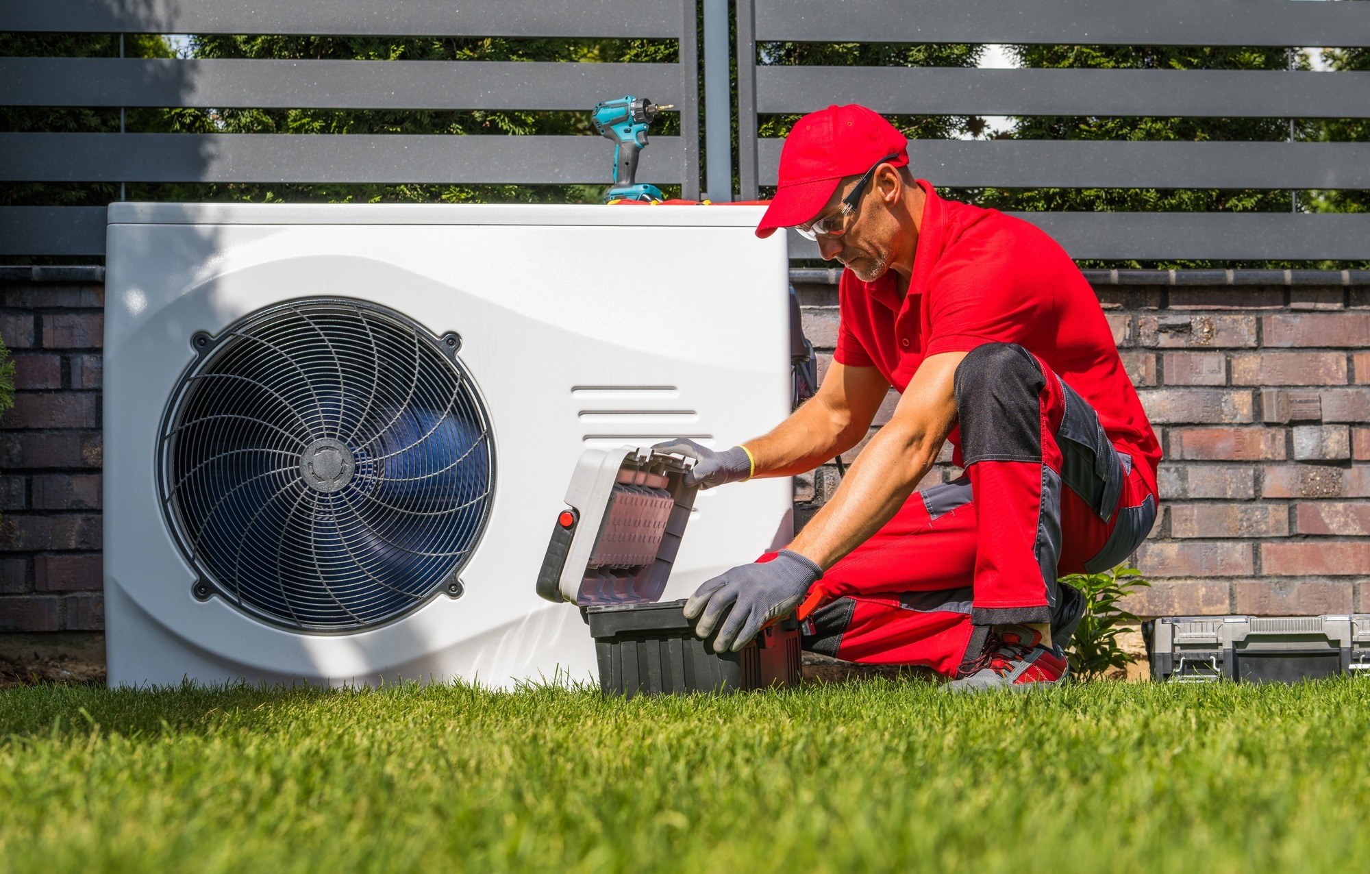 Technician Installing New Residential Modern Heating Device